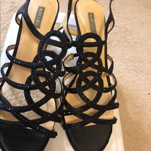 Beautiful sequined black heels. Size 8.